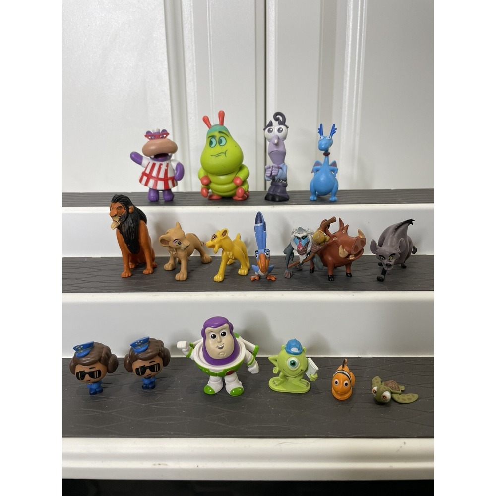 Lot of Assorted Disney Figures Finding Nemo Lion King Toy Story Doc McStuffins